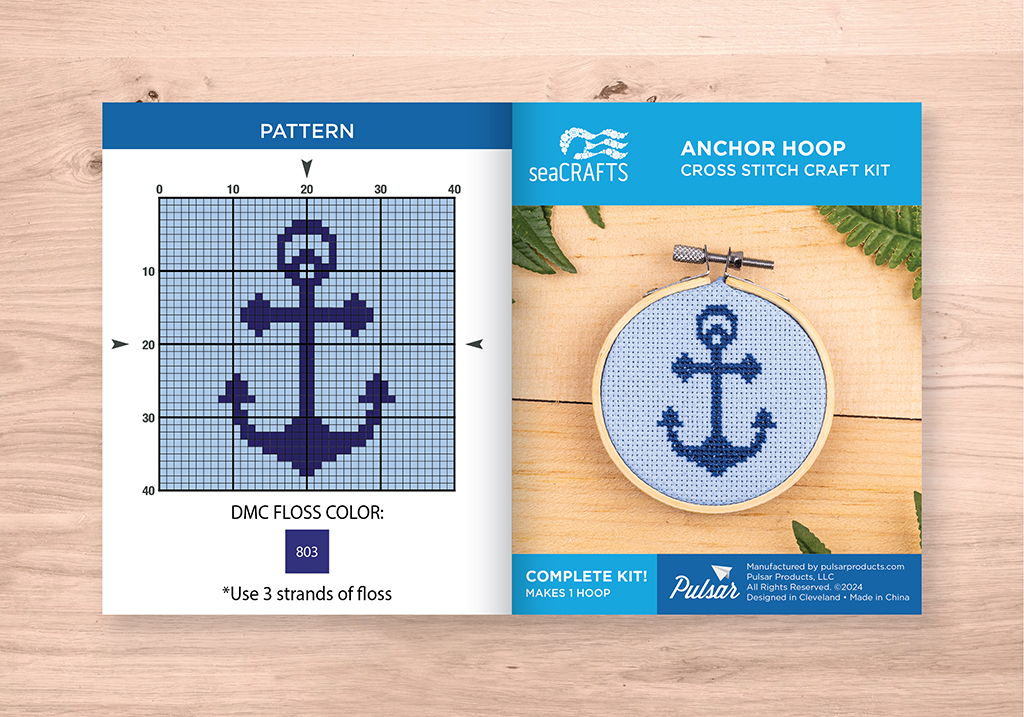 Front of instructions with product shot and final pattern on a light wood background